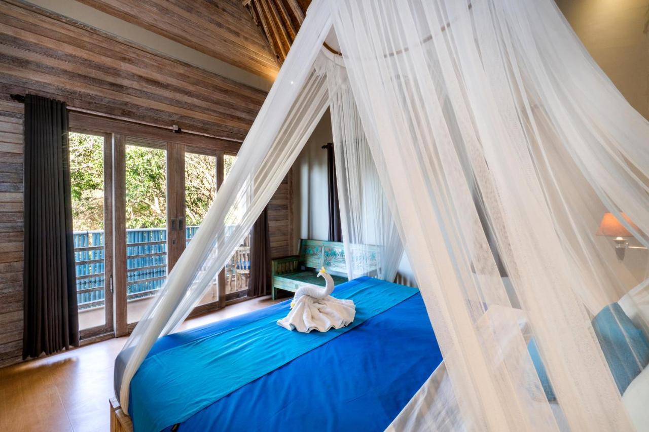 Song Lambung Beach Huts Нуса-Лембонган Екстер'єр фото